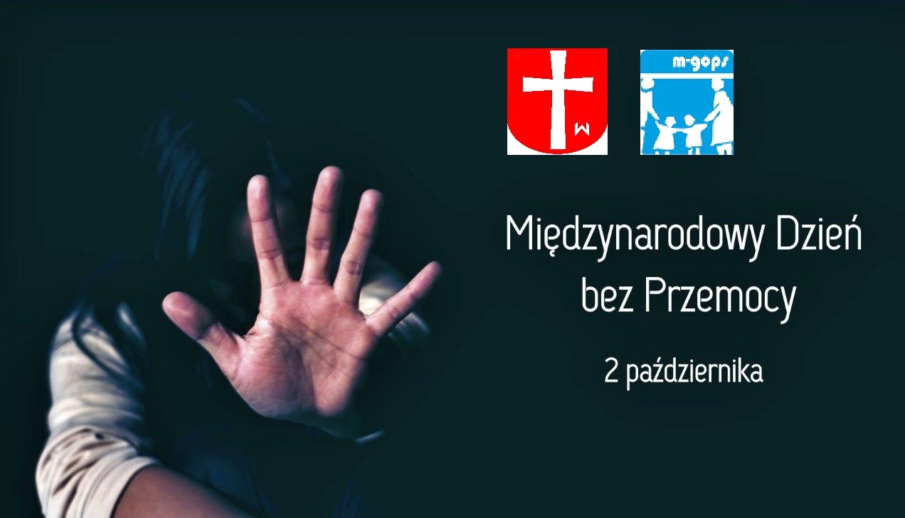 Na zdjęciu grafika informująca o międzynarodowym dniu bez przemocy. Osoba wyciągająca dłoń w geście – stop, na czarnym tle. Ma plakacie logo gminy w Sompolnie oraz MGOPS w Sompolnie